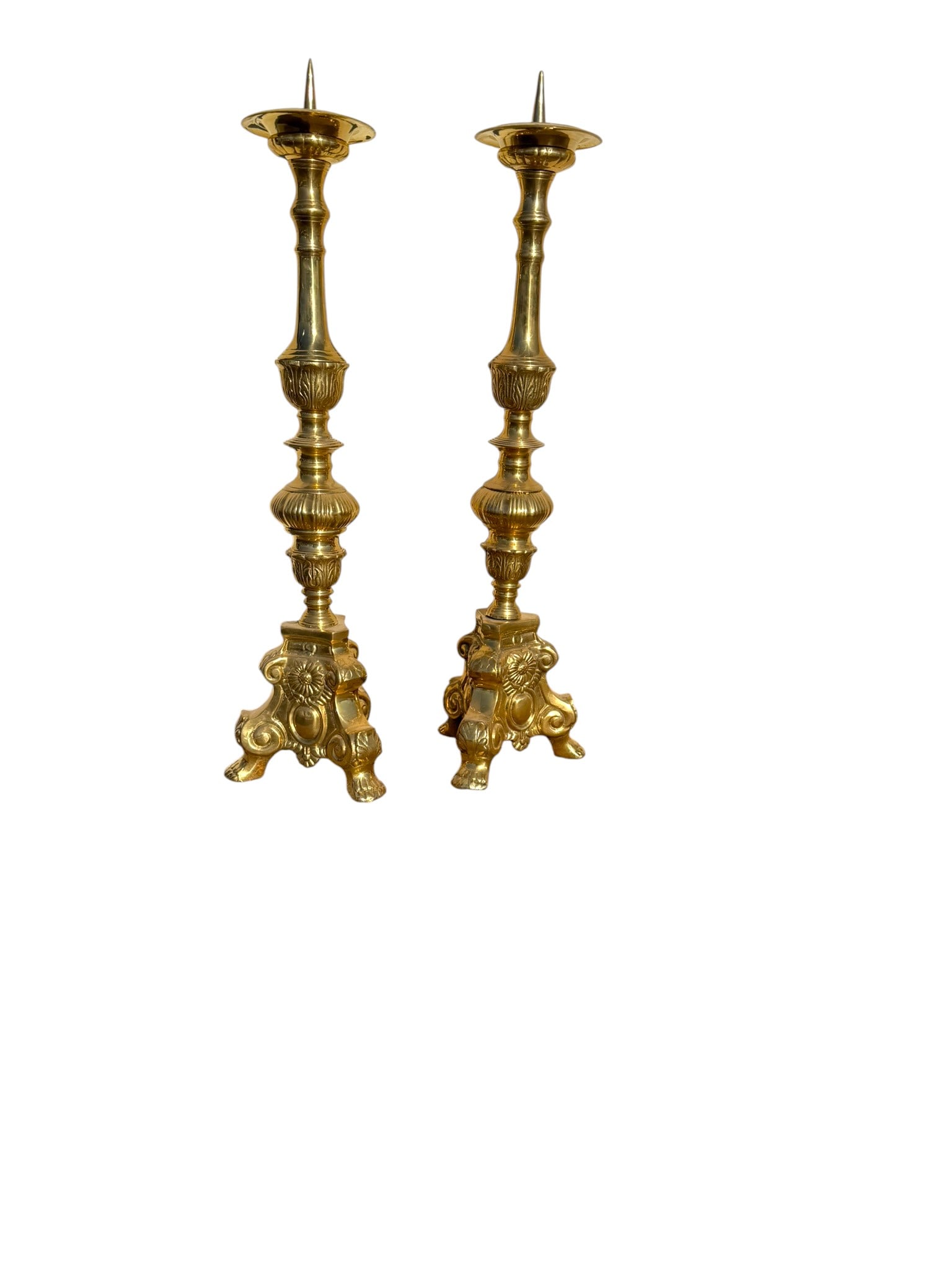 Pair of 19th Century Baroque Bronze Candle Holders: This pair of 19th century Baroque bronze candle holders features elegant proportions and richly cast detailing, offering a timeless decorative accent for mantels, consoles, or formal dining settings. 