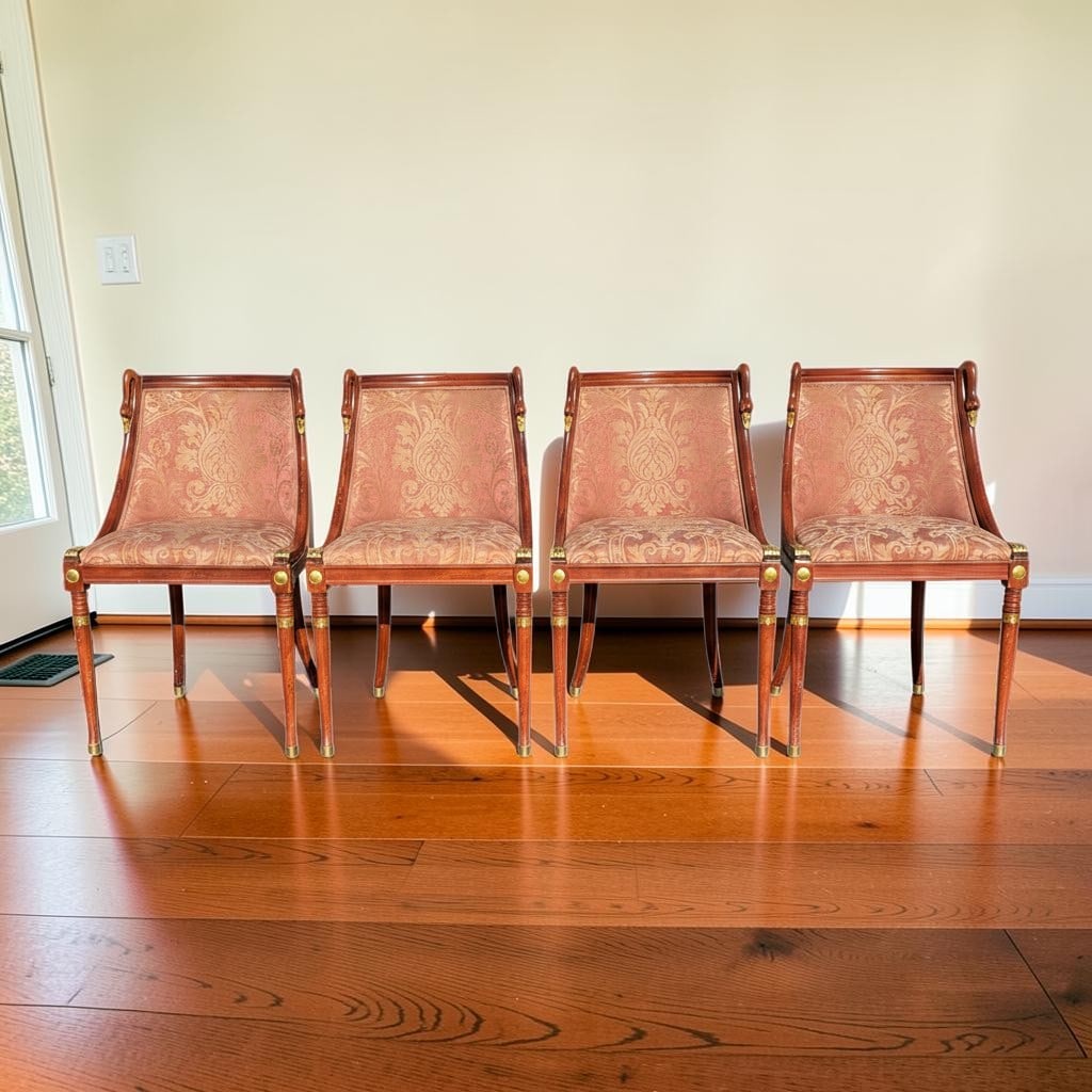 Set of 4 Antique French Empire Style Mahogany Swan Neck Dining Chairs 1890c: This elegant set of four antique French Empire style Swan Neck dining chairs, circa 1890, features richly polished mahogany frames with beautifully upholstered seats and backs in a classical damask fa
