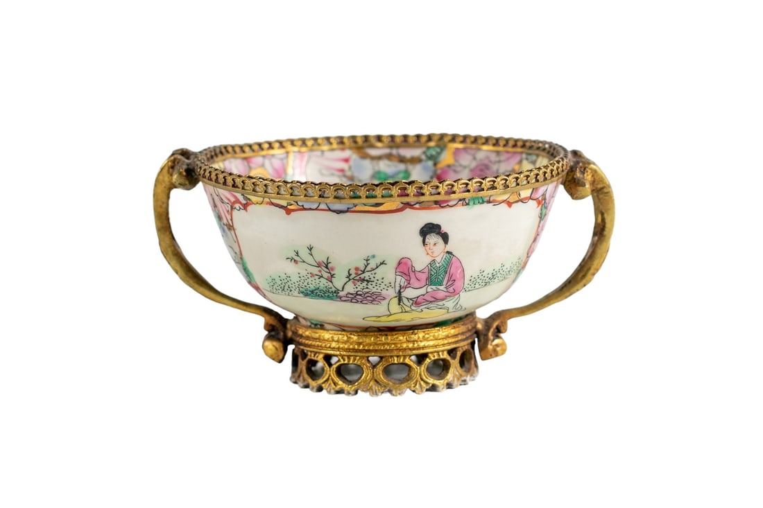 Antique 19th Century Chinese Porcelain Cup - Gilt Bronze Mount: Beautiful Chinese Porcelain Cup, with a rich decoration of flowers and tree leaves all around the piece as well as landscapes and characters with gilt bronze trim. It features a porcelain material tha