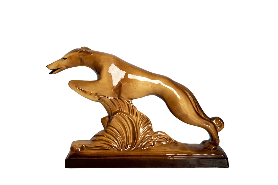 Mid-20th Century Art Deco of Greyhound Signed by Designer Saint Radegonde: Introduce timeless elegance into your living space with a exquisitely crafted Art Deco Russian Greyhound Borzoi figurine signed by St. Racronde. A nod to the opulence of the Art Deco era, this piece c
