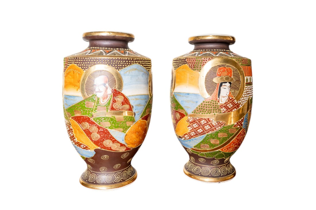 Pair of Antique Japanese Hand Painted Moriage Polychrome Ceramic Satsuma Pottery Vases - Large: This Pair of Antique Japanese Hand-Painted Moriage Polychrome Ceramic Satsuma Pottery Vases estimated to be around from 1900-1920c, showcases exquisite textured detailing and vibrant colors in the tra