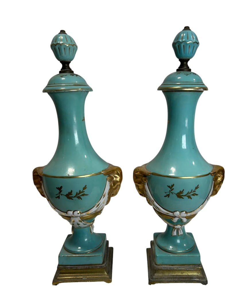 Pair of Antique French Sevres Style Porcelain Decorative Urns Gold Enamel & Bronze Base: An elegant pair of antique French Sevres style porcelain decorative urns with gold enamel decoration, featuring a beautiful turquoise celeste blue finish accented with delicate gilt detailing and orna
