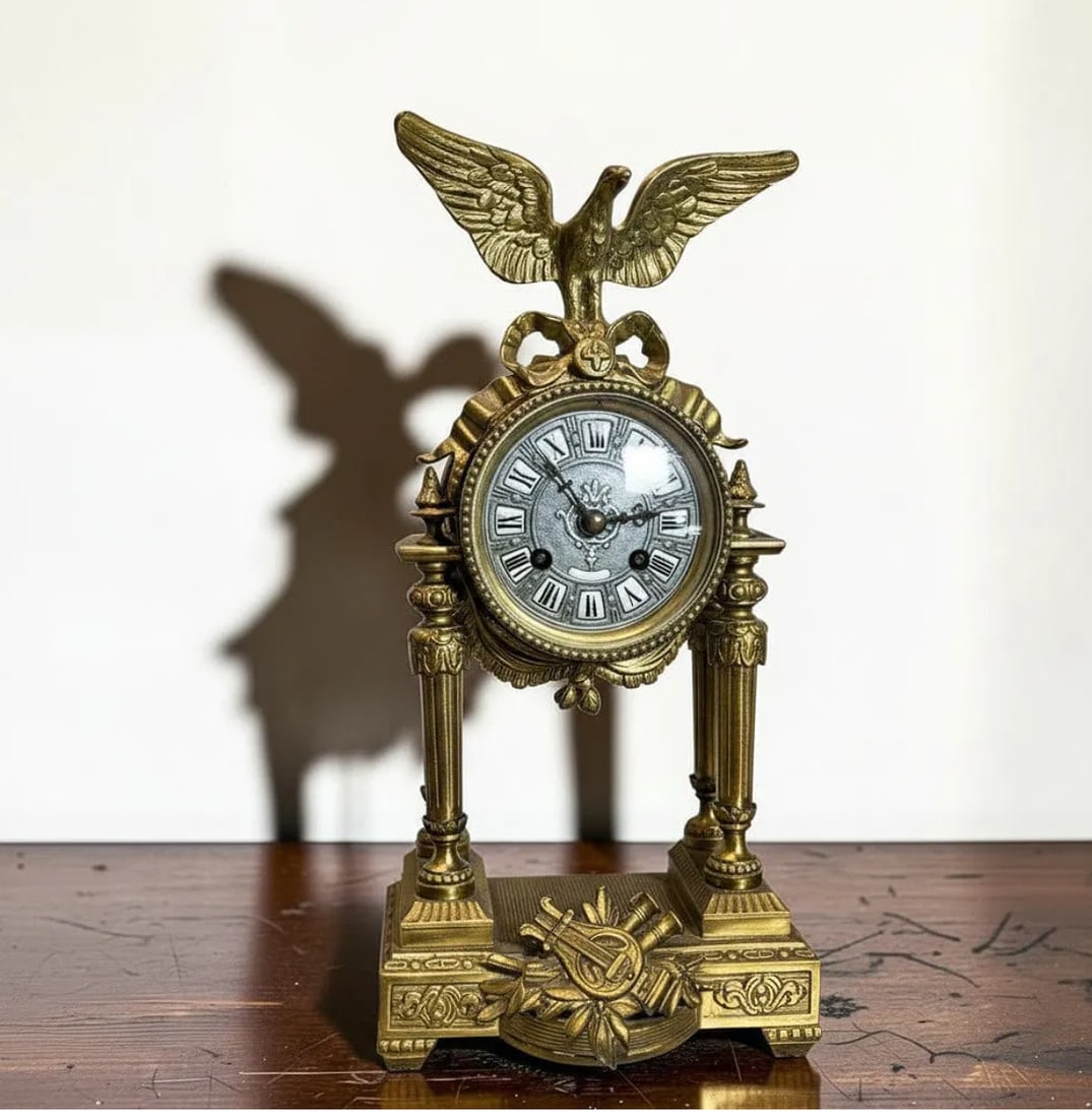 19th Century Antique French Empire Style Bronze Eagle Portico Mantel Clock Lay Fnt/Pce Jouffroy 29: This striking antique French Empire style bronze Portico mantel clock features an impressive spread-wing eagle finial mounted above a classically inspired columnar architectural case. Rich in patrioti