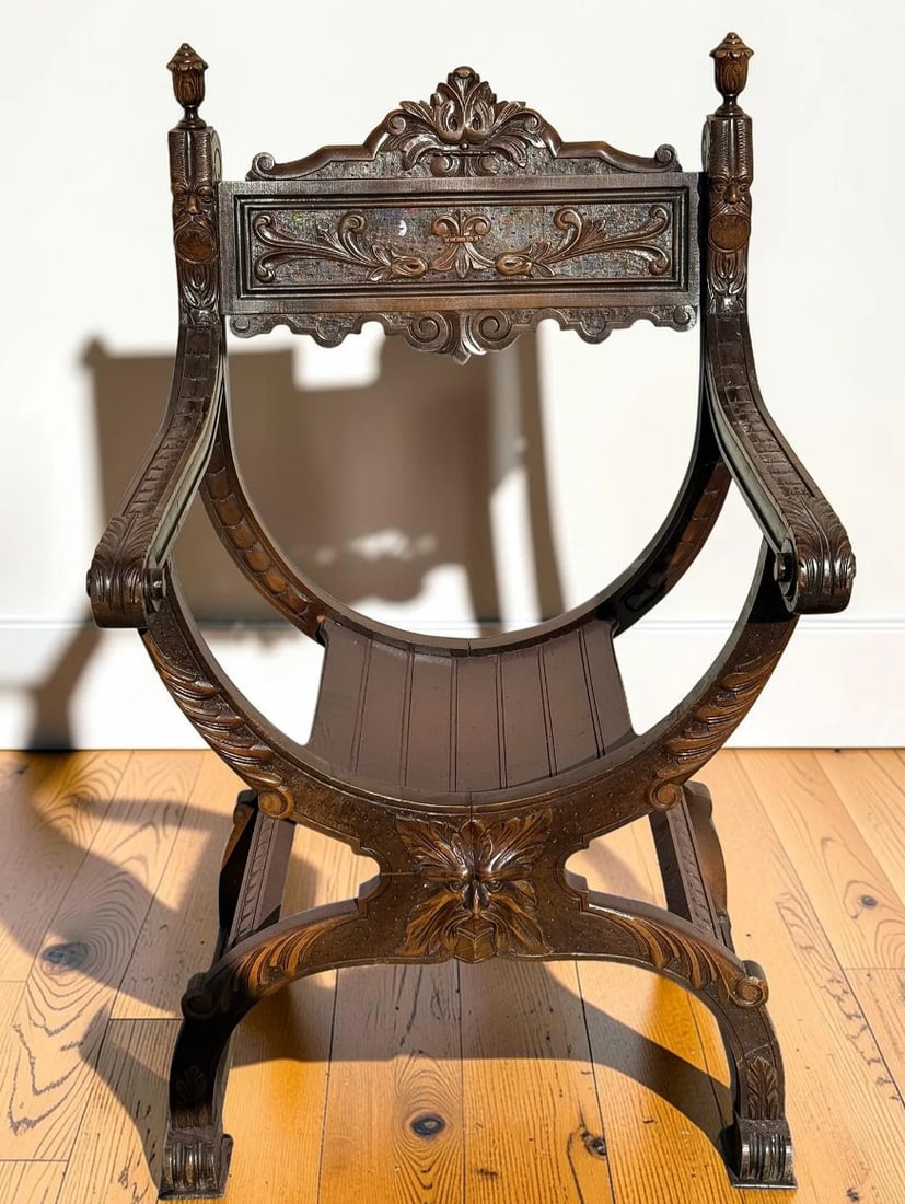 19th Century Antique Oak Renaissance Savonarola Dante Dagobert Throne Chair: This impressive 19th Century antique oak Renaissance Savonarola Dante Dagobert throne chair is a remarkable example of Renaissance Revival craftsmanship and medieval-inspired European design. Expertly