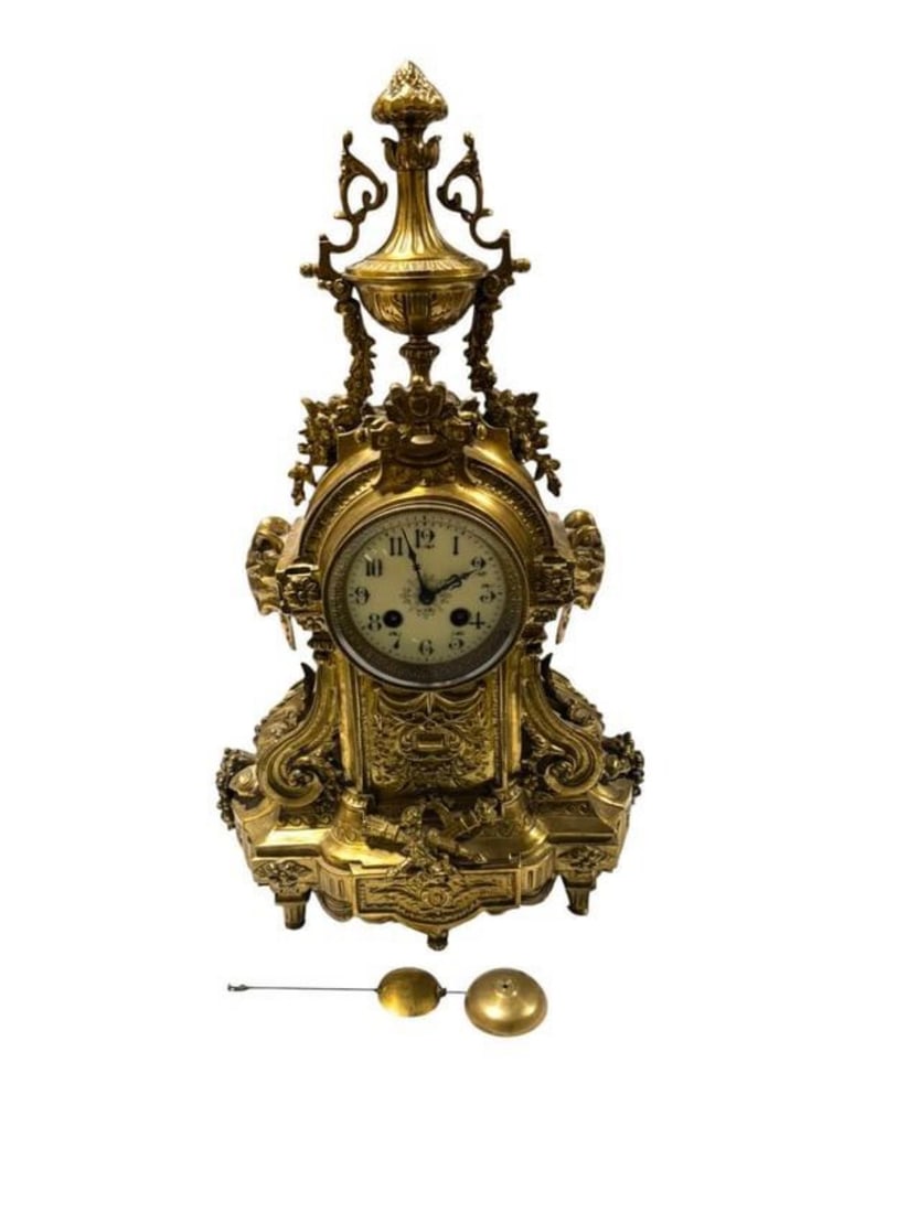 Antique Early 1900s French Brass Rococo Mantel Clock Ornate Baroque Gilded Table Clock: This Antique Early 1900s French Brass Rococo Mantel Clock features an ornate Baroque-inspired design with flowing curves, rich gilded accents, and finely cast detailing typical of the period. Its eleg