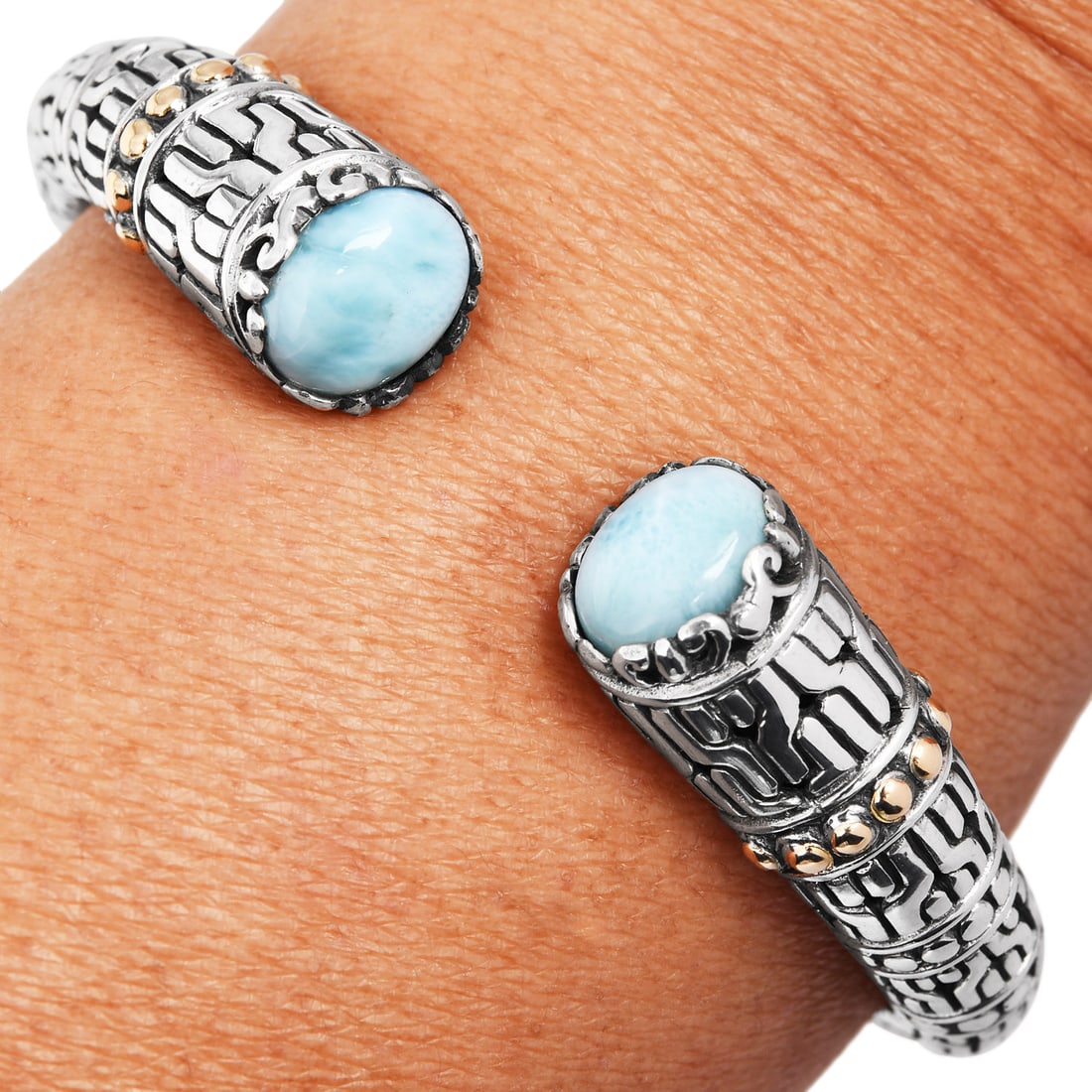 Estate Larimar 18K Yellow Gold Sterling Silver Curvy Halo Bali Bangle 35.9 Grams: Estate Larimar 18K Yellow Gold Sterling Silver Curvy Halo Bali Bangle Product Description: This **stunning estate Bali bangle** showcases intricate craftsmanship
