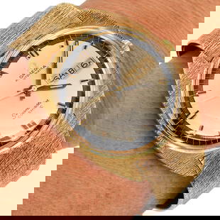 Omega Vintage Seamaster Cosmic 18K Bark-Finish Yellow Gold 33MM Watch 91.8 Grams: Vintage Omega Seamaster Cosmic 18K Yellow Gold Automatic Watch with Bark Bracelet Product Description: This collectible Vintage Omega Seamaster Cosmic