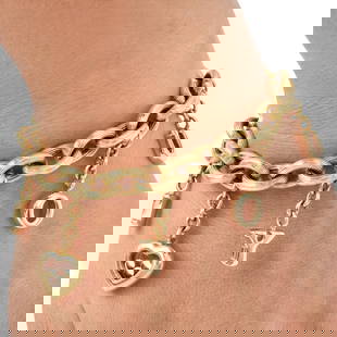 Chopard Happy Diamonds 'I Love You' Charm 18K Gold Bracelet  31.5 Grams: Chopard Happy Diamonds ?I LOVE YOU? 18K Yellow Gold Charm Bracelet Product Description: A playful and romantic design by Chopard, this Ha