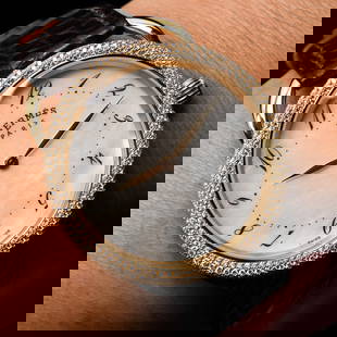 Hermes Arceau Diamond 18K Yellow Gold 38mm Watch Ref AR5.786 68 Grams $35,500: Herm?s Arceau Diamond Yellow Gold 38mm Watch Ref AR5.786 Product Description: Indulge yourself with this exquisite Herm?s Arceau 38mm Watch, craf