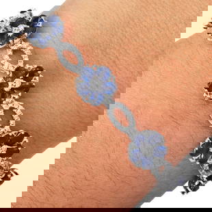 Estate Diamond 11.11ct Sapphire 14K White Gold Floral Link Bracelet 14.1 Grams: Estate Diamond 11.11ct Sapphire 14K White Gold Floral Link Bracelet SKU: RAMC-01 Product Description: A refined blend of elegance and vibrant color