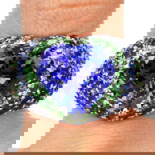 Estate Tanzanite 13.24ct Sapphire Tsavorite 18K White Gold Pave Heart Cocktail Ring: Estate Tanzanite Sapphire Tsavorite 18K White Gold Pave Heart Cocktail Ring SKU: HLC-09 Product Description: Make a bold statement with this dazzli