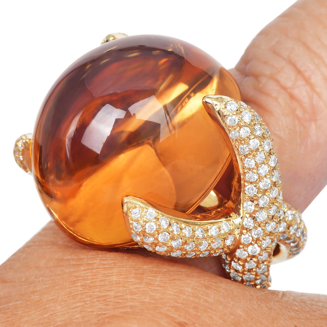 Estate Citrine 49.03ct Diamond 18K Yellow Gold Cocktail Ring 23.7 Grams: Item: Estate Citrine Diamond Cocktail Ring Description:Estate cocktail ring crafted in 18 karat yellow gold, featuring a substantial citrine cabochon weighing approximately 46.81 carats. The center st