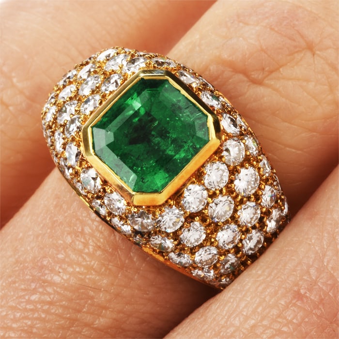 Vintage Tiffany and Co. Diamond 5.70ct GIA Emerald 18K Gold Engagement Cocktail Ring 9.9 Gram: This alluring Tiffany and Co.ring has many focal points of interest and was crafted in 18K Yellow Gold. Featuring an Asscher cut GIA certified Emerald