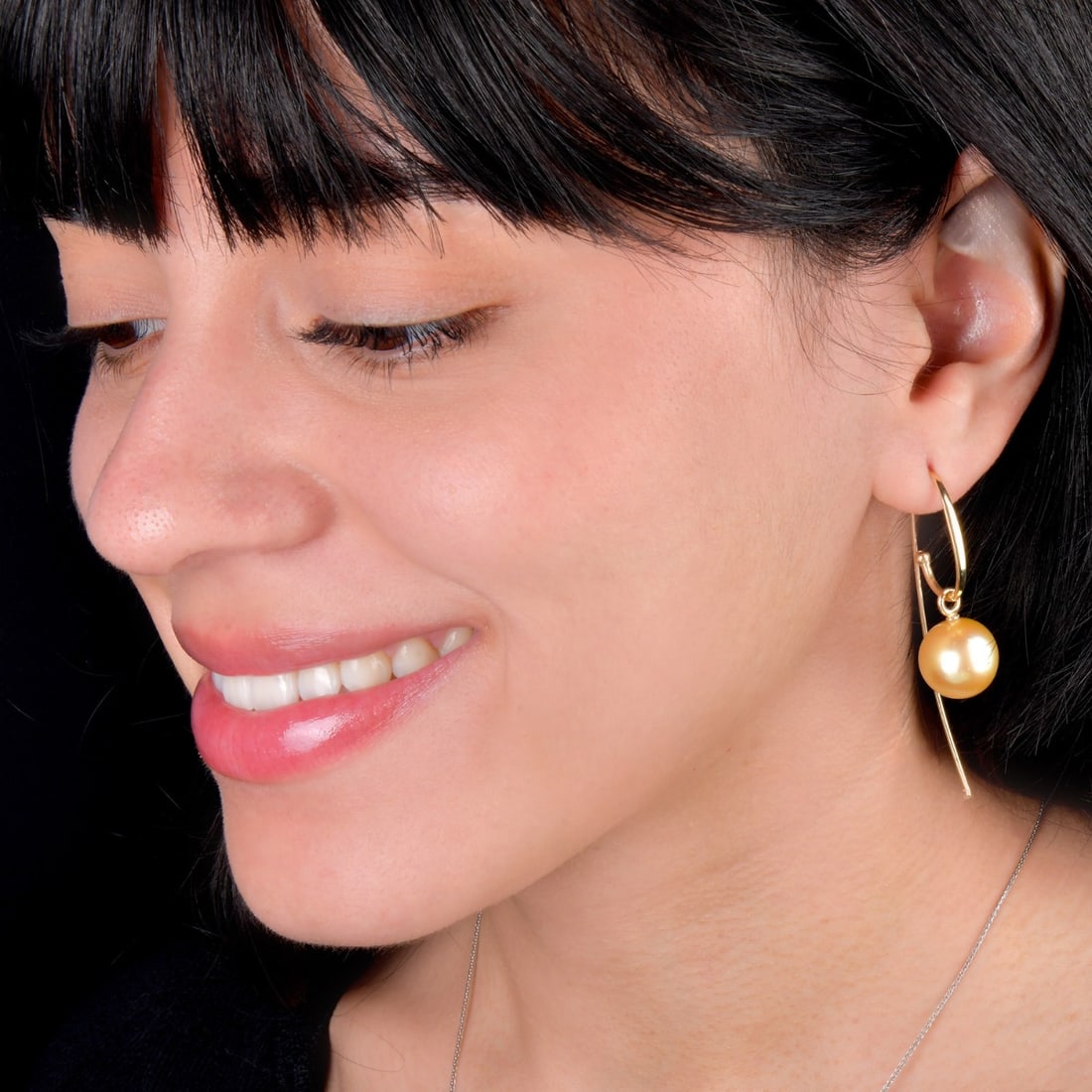 14mm Golden South Sea Pearl 14K Yellow Gold Wire Drop Earrings 11.6 Grams: p data-start="526" data-end="1141">These exquisite natural Golden South Sea pearl earrings bring together luxurious color and refined minimalism. Crafted in 14K yellow gold, each earring features a ra