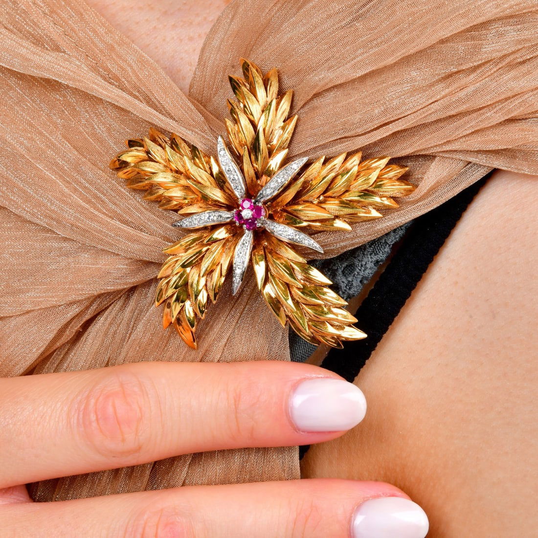 Tiffany & Co Diamond Ruby Pine Cone Flower Motif 18K Gold Brooch 23 Grams: A striking mid-century brooch by Tiffany & Co., designed in a bold pine cone motif with sculptural dimension and exceptional craftsmanship. Crafted in rich 18K yellow gold with contrasting 18K white g