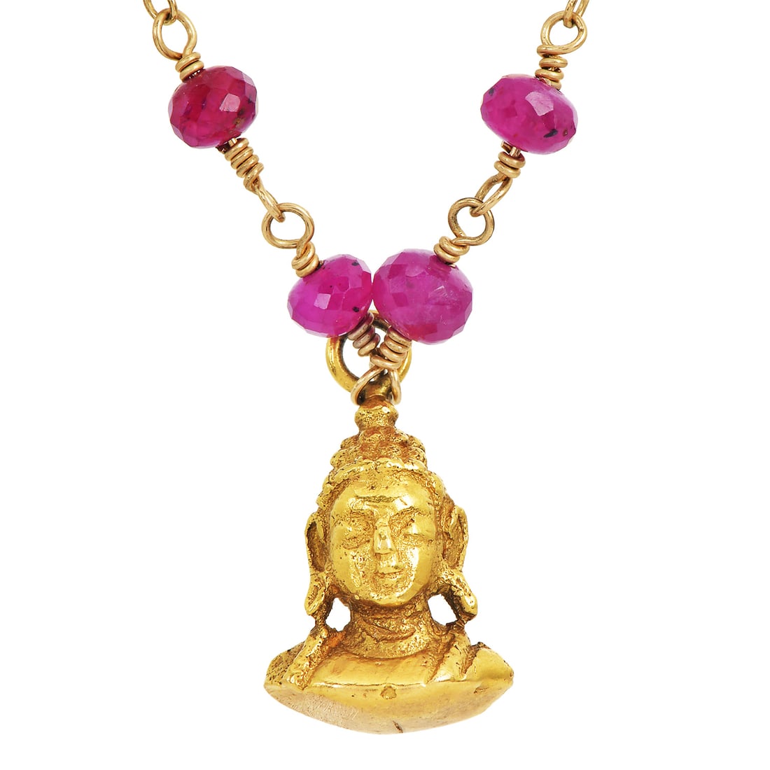 Buddha Head Ruby 21K & 14K Yellow Gold Station Necklace: Item: Buddha Head Ruby 21K & 14K Yellow Gold Station Necklace Description:Station necklace featuring a Buddha head pendant crafted in 21 karat gold, set along a 14 karat gold chain accented with ruby