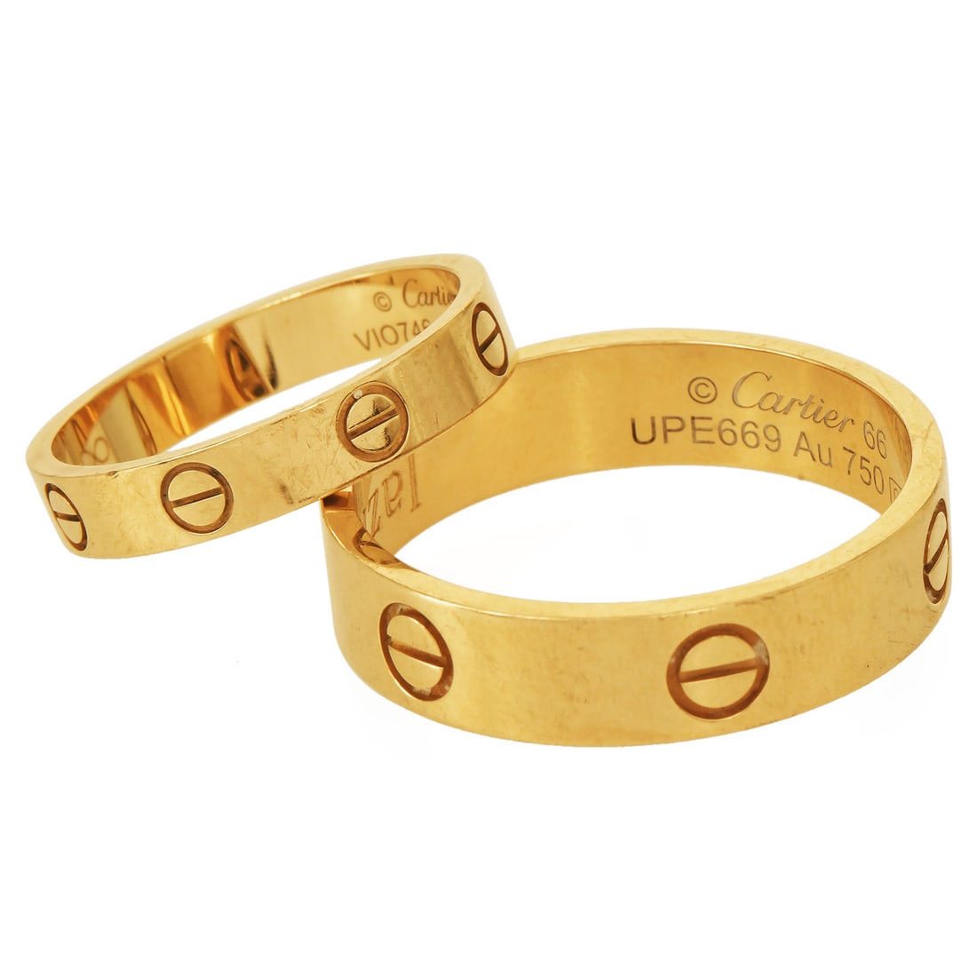 Cartier Love 18K Yellow Gold His & Her Band Rings Set With Box and Papers: Cartier Love 18K Yellow Gold His & Her Band Rings Set Retail Value: $3,580 (Combined) Iconic and timeless, this authentic Cartier Love ring set features matching his and her bands crafted in luxurious
