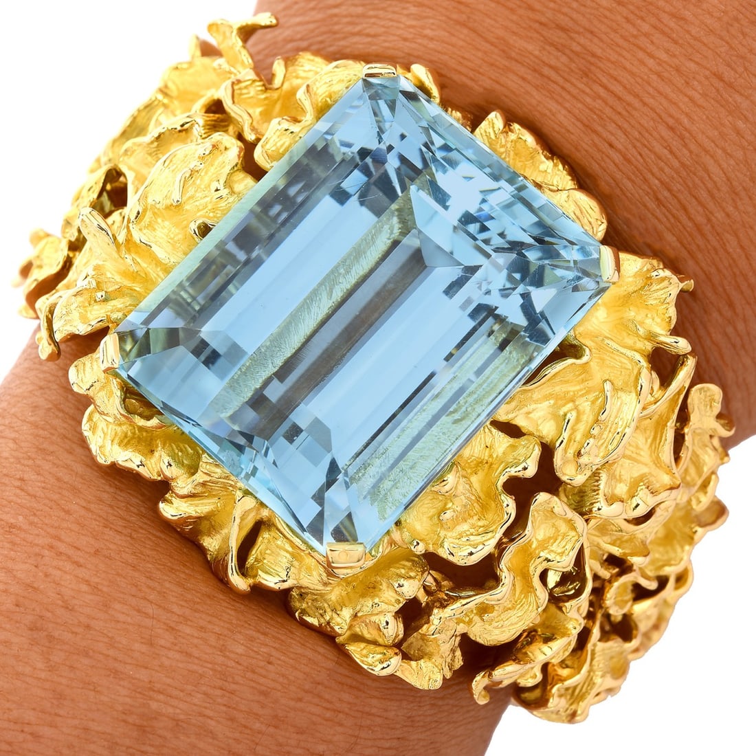 1970S GIA 124.79cts Aquamarine 18K Yellow Gold Nugget Link Bracelet 145.6 Grams: A show Stopper! for a bright and unique wearer. Adorn your arm with this statement piece, an aquamarine wide nugget gold bracelet. Crafted in solid