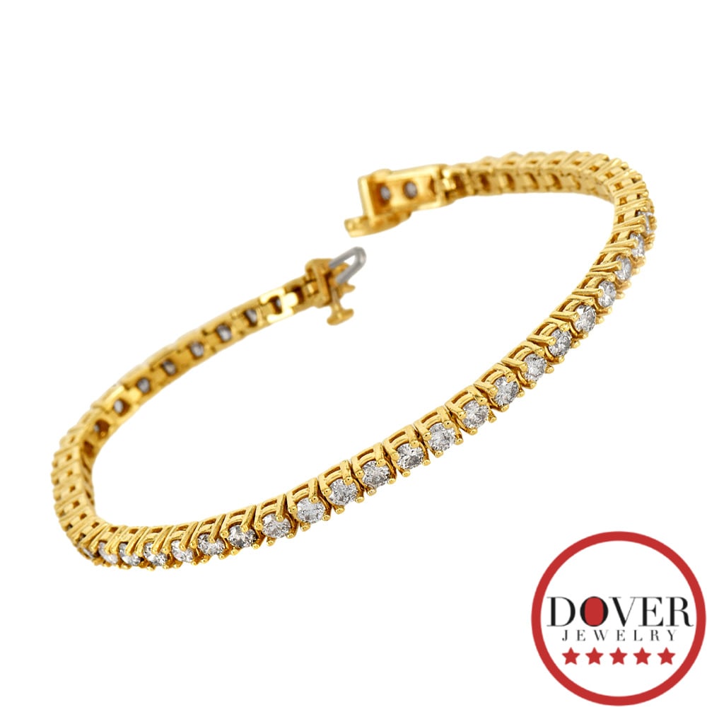 Estate 4.50ct Diamond 14K Yellow Gold Line Tennis Bracelet 12.7 Grams: Estate Diamond 14K Yellow Gold Line Tennis Bracelet Metal: 14K Yellow Gold Length: Approximately 7.25 inches Total Weight: Approximately 12.7 grams