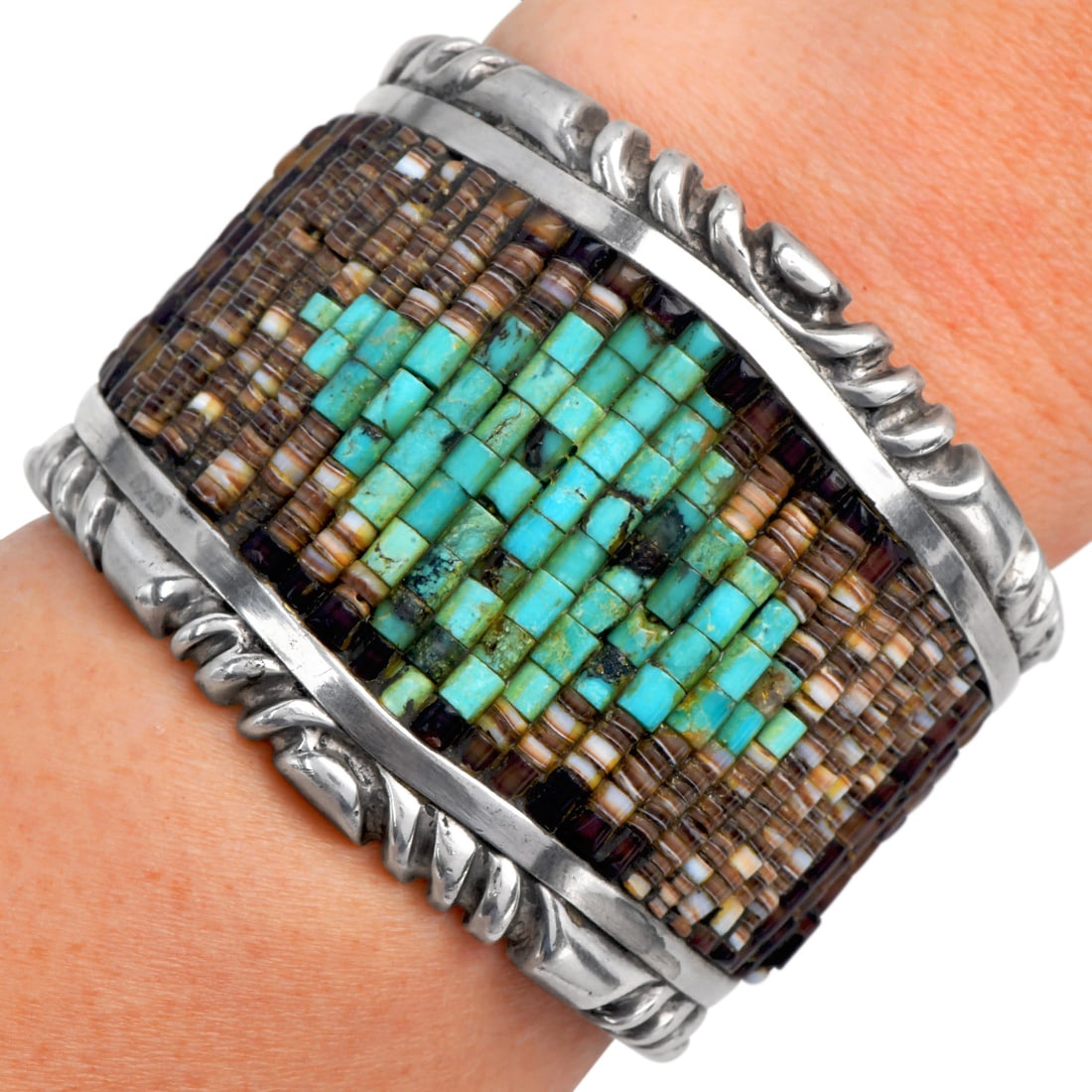 Vintage Navajo Sterling Silver Hand Cut Turquoise and Shell Heishi Rows Bangle: Vintage Navajo Sterling Silver Turquoise & Shell Heishi Bracelet Metal: Sterling Silver Wrist Size: Approximately 6 inches Width: Approximately 51 mm tapering to