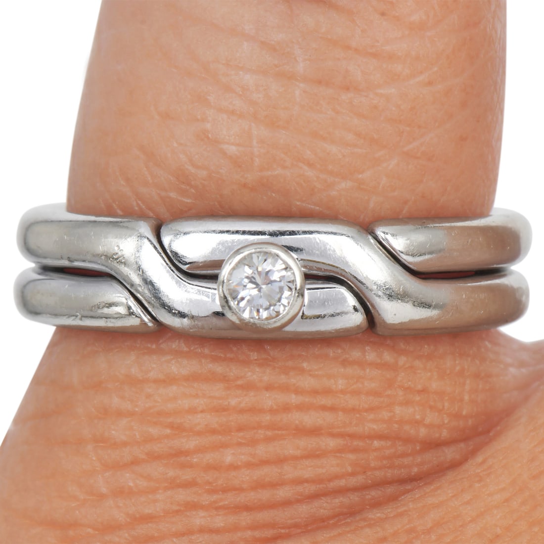 Tiffany & Co Paloma Piccaso Diamond 18K White Gold Puzzle Ring 7.2 Grams: Metal: 18K White Gold Ring Size: 6.5 Total Weight: Approximately 7.2 grams Primary Stone: Diamond Total Carat Weight: Approximately 0.10 carats