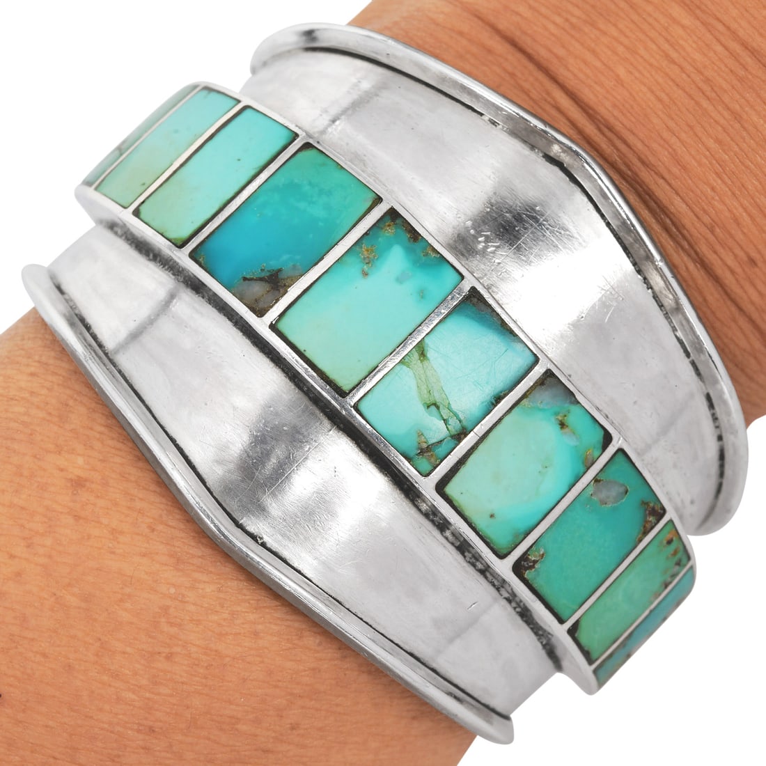 Vintgae Signed Navajo Turquoise Sterling Silver Wide Cuff Bangle 72.2 Grams: 46mm by 28mm SKu is DDJE-04 Vintage Signed Navajo Turquoise Sterling Silver Wide Cuff Bangle Metal: Sterling Silver Measurements: Approximately 46 mm tapering to 28 mm Tot