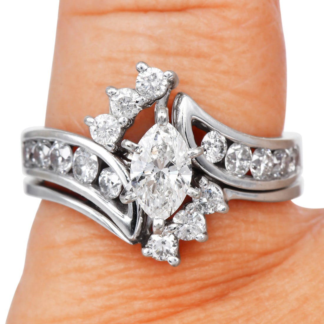 Estate 1.40ct Diamond 14K White Gold Engagement & Wedding Band Set 6.1 Grams: Diamond 14K White Gold Engagement & Wedding Band Set A timeless and elegant bridal set crafted in solid 14K white gold, featuring a classic marquise-cut center diamond paired with a removable