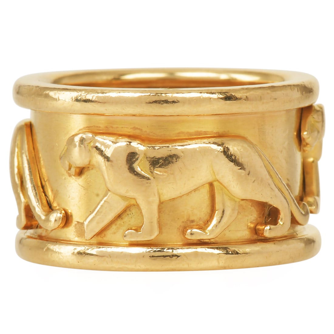 Vintage Cartier Walking Panther 18K Yellow Gold Band Ring With Card: Vintage Cartier Walking Panther 18K Yellow Gold Band Ring Brand: Cartier Metal: 18K Yellow Gold Ring Size: 52 Width: Approximately 12 mm Design: Walking Panther Band Ring Includes: Original card