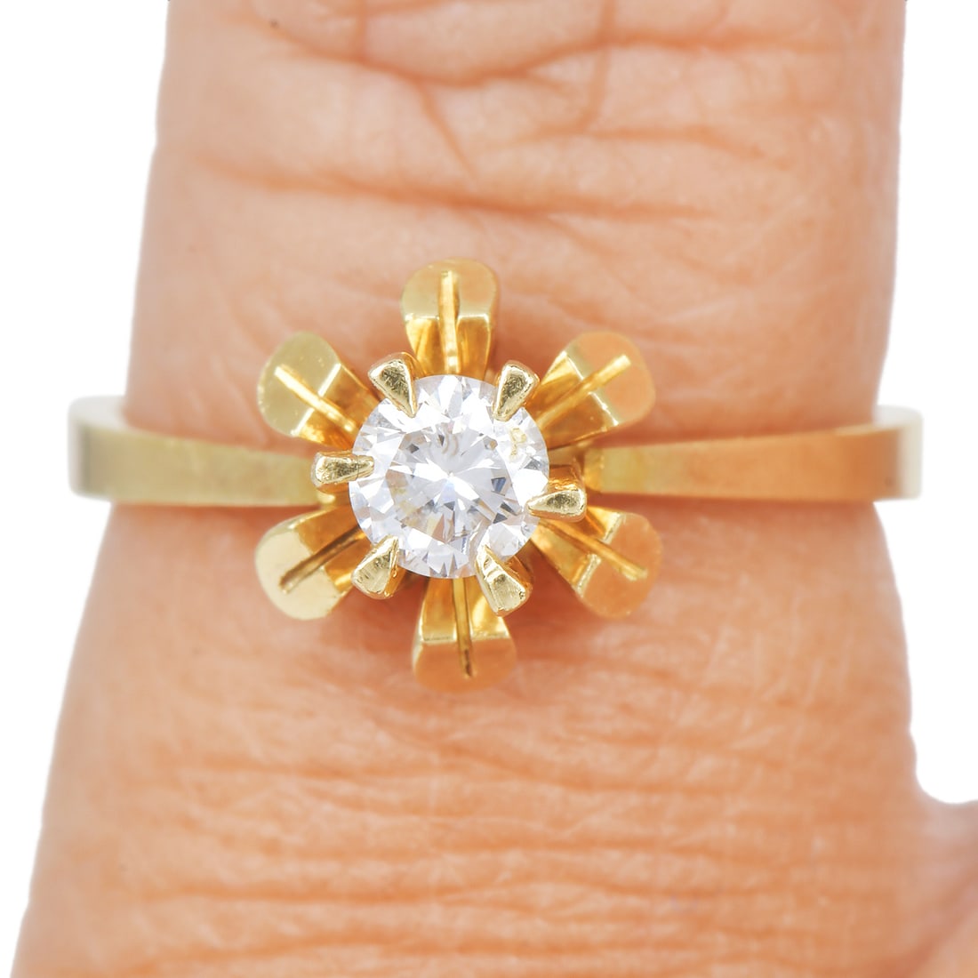 Diamond 18K Yellow Gold Cathedral Sunflower Engagement Ring 3 Grams: Diamond 18K Yellow Gold Cathedral Sunflower Engagement Ring Charming and elegant, this engagement ring is crafted in luxurious 18K yellow gold and features a classic cathedral setting with a