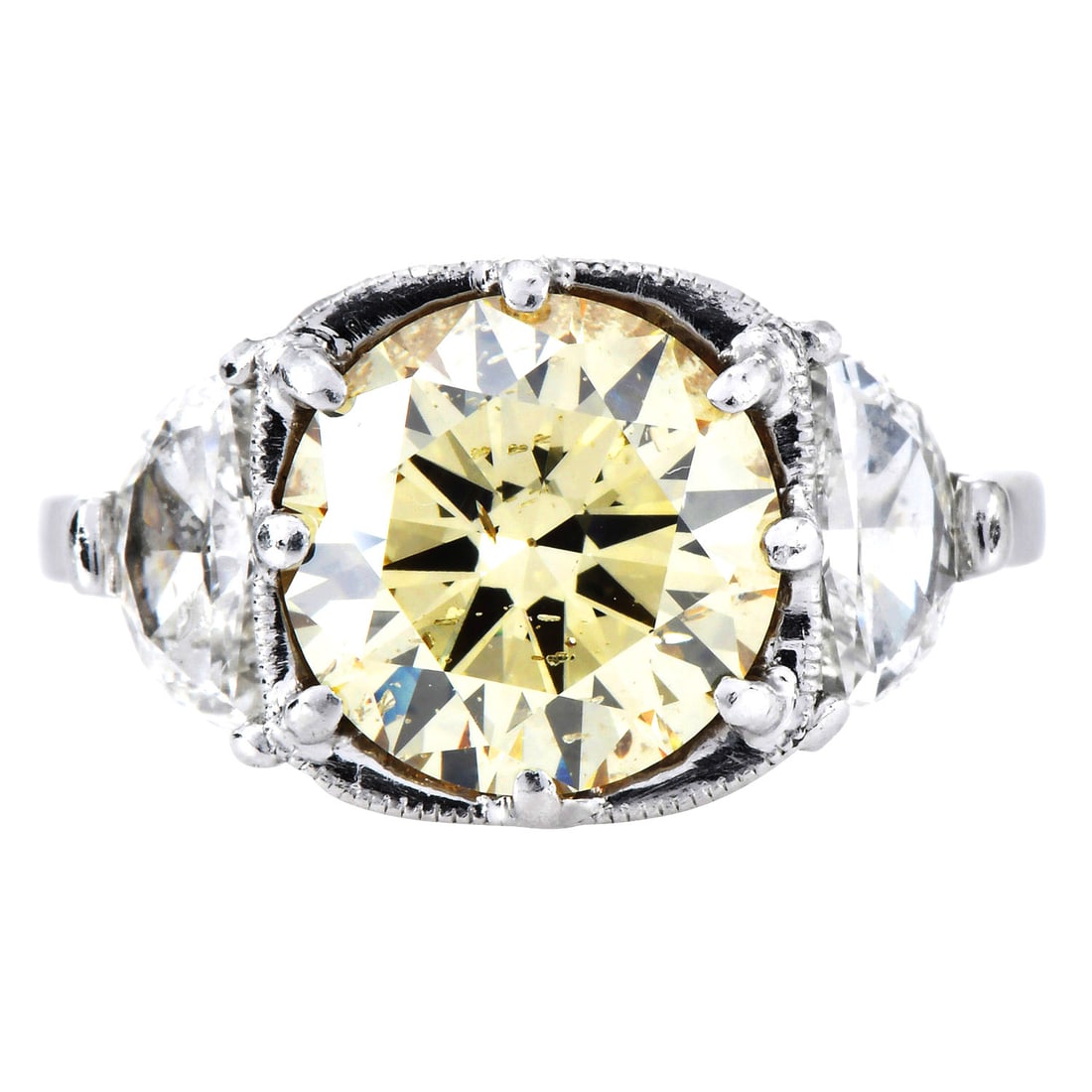 GIA Fancy Yellow 4.01ct Diamond Platinum Engagement Ring 7.5 Grams: Fancy Yellow Diamond Platinum Ring Metal: Platinum Ring Size: 5.75 Total Weight: Approximately 7.5 grams Primary Stone: GIA Certified Fancy Yellow Diamond Cut: Round Brilliant Cut Total Carat Weight: