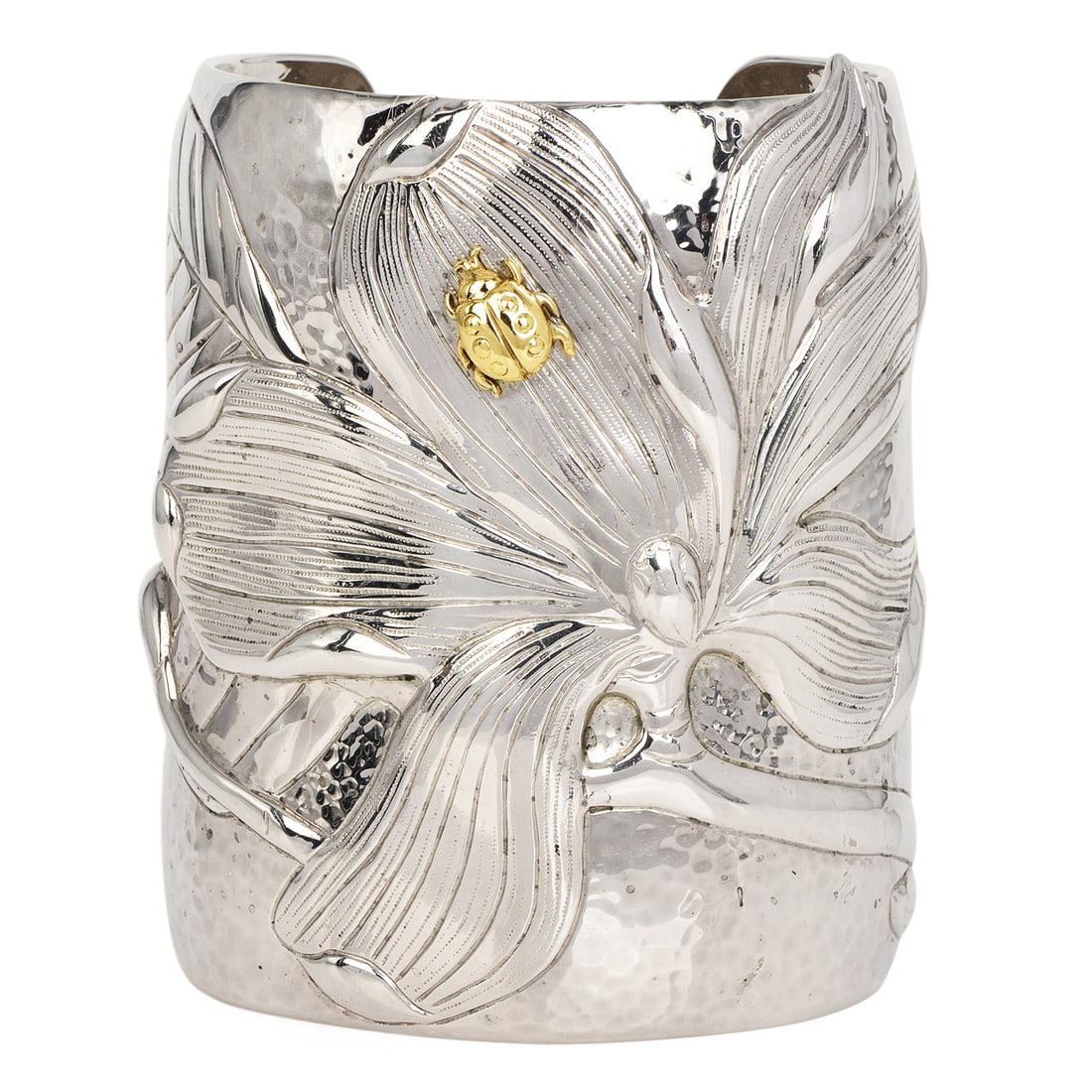 Tiffany & Co. Magnolia Ladybug Sterling Silver and 18K Yellow Gold Cuff Bracelet 178.1 Grams: Tiffany & Co. Magnolia & Ladybug Sterling Silver and 18K Yellow Gold Cuff Bracelet An exceptional Tiffany & Co. cuff bracelet featuring the celebrated Magnolia & Ladybug motif. Crafted in sterling sil