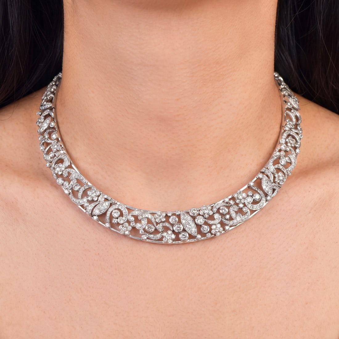 Vintage 12.00ct Diamond 10K White Gold Floral Choker Necklace 75.6 Grams: Vintage Diamond 10K White Gold Floral Choker Necklace Metal: 10K White Gold Total Weight: 75.6 Grams Diamond Weight: Approximately 12.00 Carats Total Diamond Shape: Round Brilliant Cut