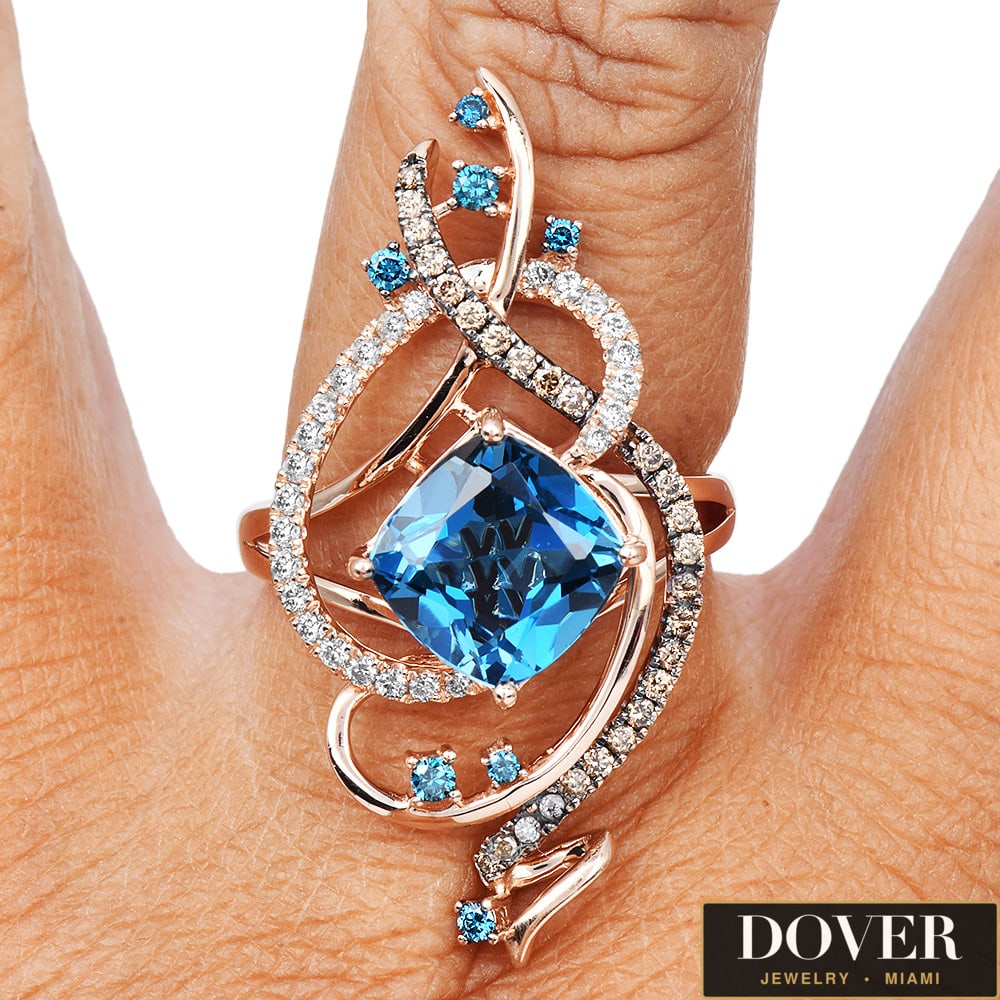 Le Vian Crazy Collection Diamond Blue Diamond & Deep Sea Blue Topaz 14K Rose Gold Ring: Le Vian Crazy Collection Diamond, Blue Diamond & Deep Sea Blue Topaz? 14K Rose Gold Ring Designer: Le Vian Hallmarks: "Le Vian" Metal: 14K Rose Gold Total Weight: Approximately 8.8 Grams<