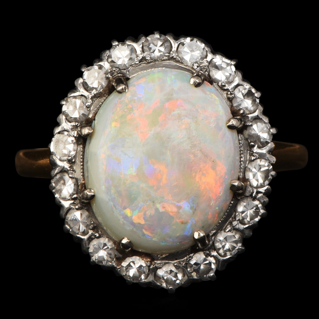 Vintage Opal 2.50ct Diamond 14K Yellow Gold & Platinum Halo Cocktail Ring: Vintage Opal Diamond 14K Yellow Gold & Platinum Halo Cocktail Ring Metal: 14K Yellow Gold and Platinum Center Stone: Opal Estimated Opal Weight: Approximately 2.