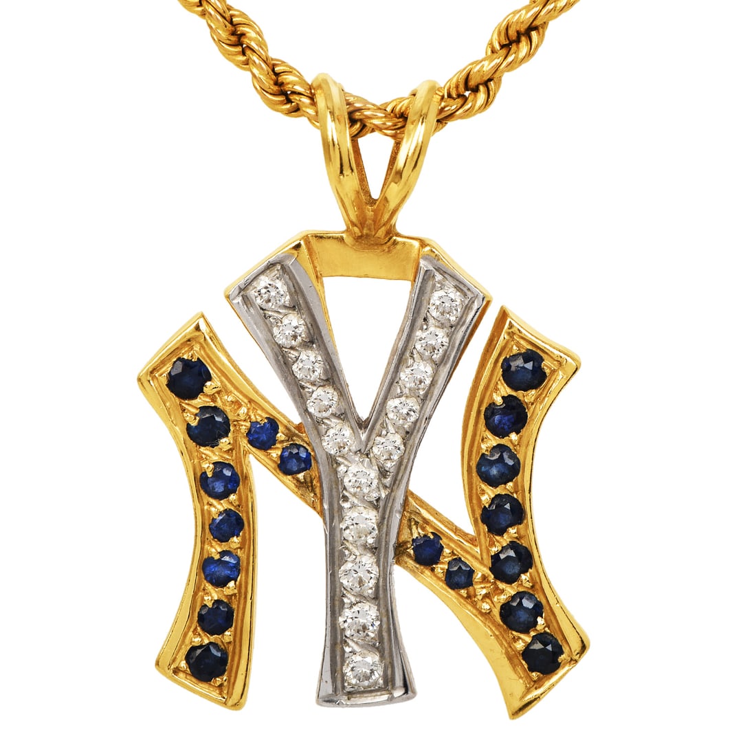 Estate Yankees Diamond Sapphire 14K White & Yellow Gold Logo Pendant 6 Grams: Estate Yankees Diamond & Sapphire 14K White & Yellow Gold Logo Pendant Style: Yankees Logo Metal: 14K White and Yellow Gold Diamonds: Approximately 0.20 carats t