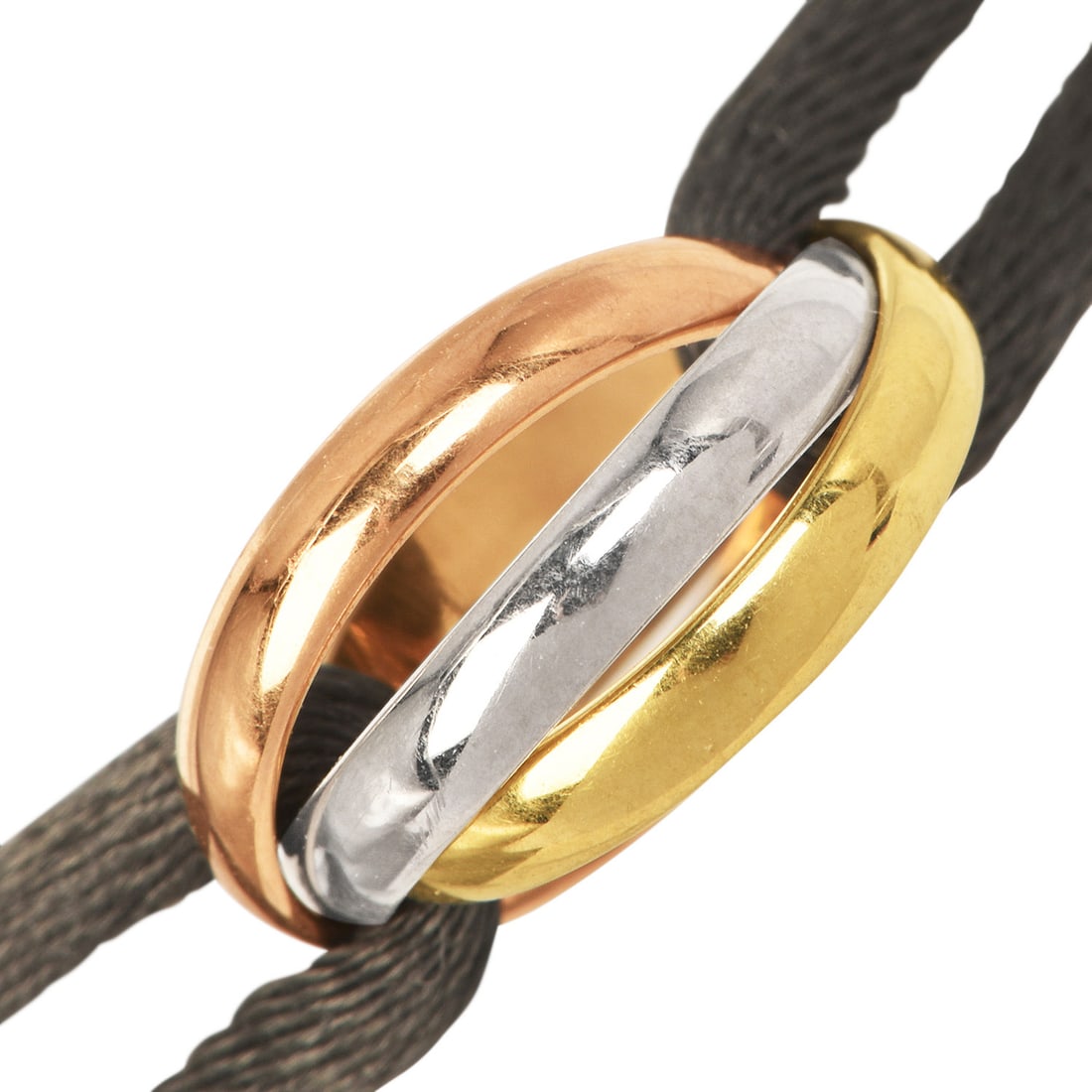 Cartier Trinity 18K Gold Cord Bracelet Retail $1080: Cartier Trinity 18K Gold Cord Bracelet Designer: Cartier Collection: Trinity Metal: 18K Rose Gold, 18K White Gold, and 18K Yellow Gold Material