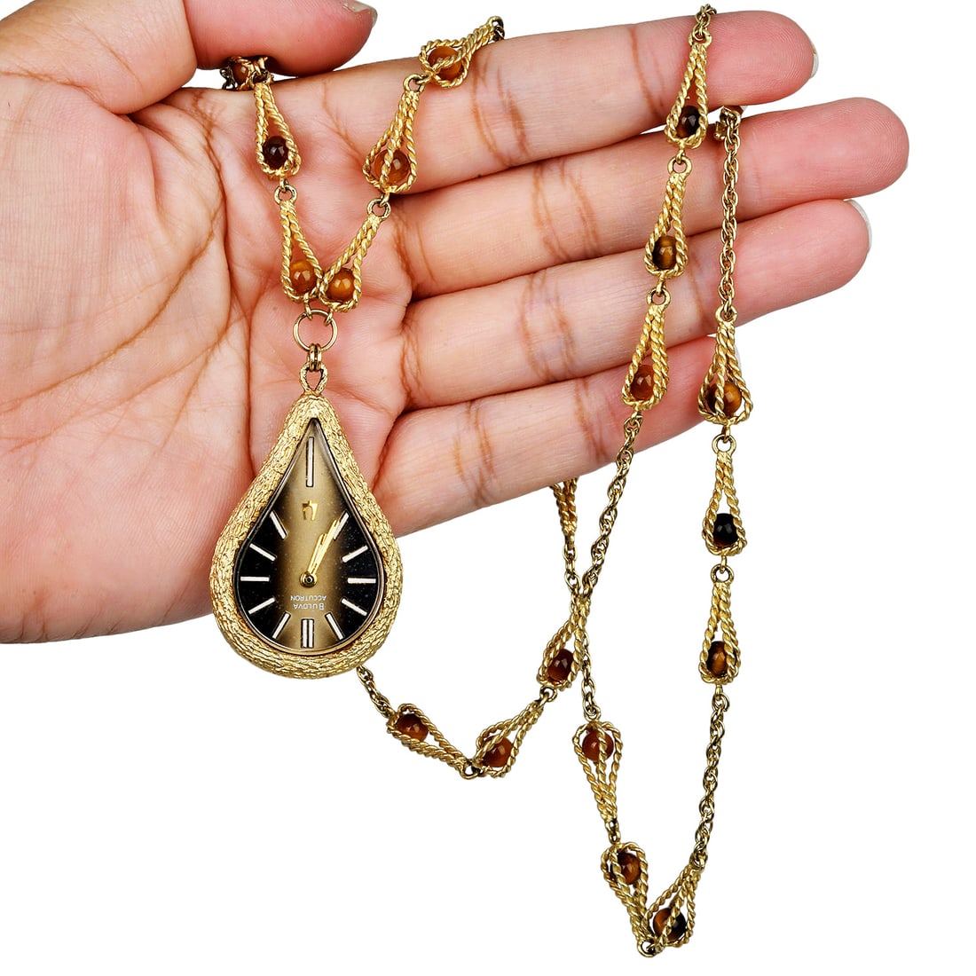 Vintage Ladies Bulova Accutron Tiger's Eye 14K Yellow Gold Necklace Watch: Vintage Ladies Bulova Accutron Tiger's Eye 14K Yellow Gold Necklace Watch Brand: Bulova Model: Accutron Era: Circa 1960s Metal: 14K Yellow