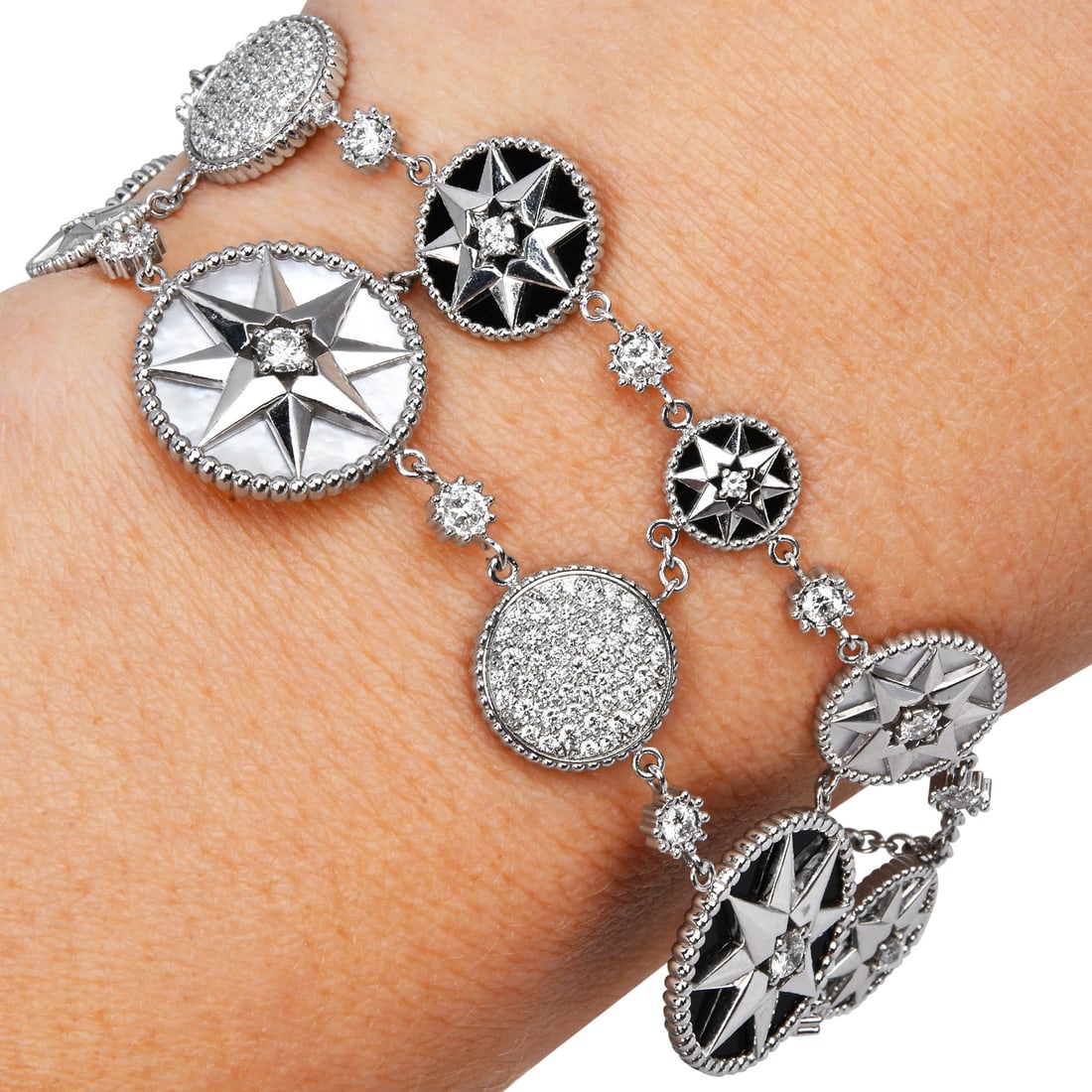 Dior Mayenne Joaillerie Rose des Vents 18K White Gold Mother-of-Pearl Onyx Diamond Bracelet: Dior Rose des Vents 18K White Gold Mother-of-Pearl, Onyx & Diamond Bracelet Brand: Dior Collection: Rose des Vents Designer: Victoire de Castellane