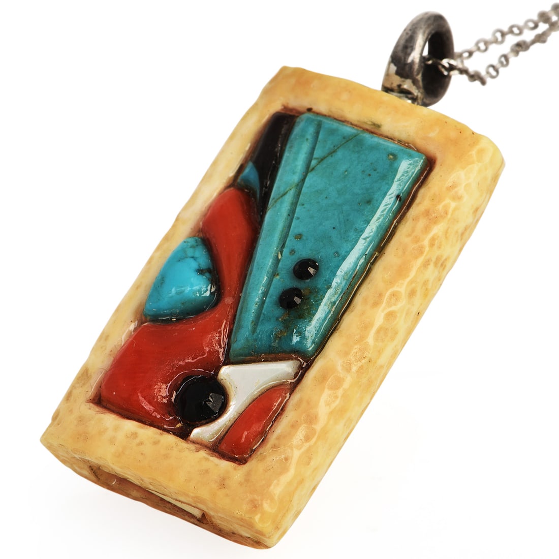Vintage Bone, Turquoise, Mother-of-Pearl, Coral, Onyx Sterling Silver Pendant 13.4 Grams: Vintage Bone, Turquoise, Mother-of-Pearl, Coral & Onyx Sterling Silver Pendant Material: Sterling Silver Gemstones: Turquoise, mother-of-pearl, coral, onyx, and bone accents