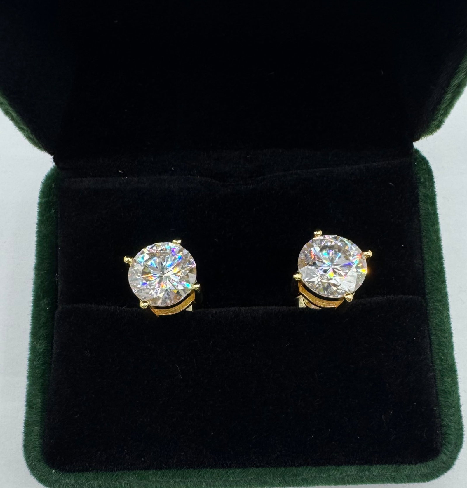 Moissanite Long Earrings in Sterling W/ Yellow Gold Overlay & COA: 3CT Earrings Moissanite , Each has 3 Carats Total Of 6 Carats Mounted in Sterling with Yellow Gold Overlay, with Certificate Of Authenticity & Jewelry pouch.