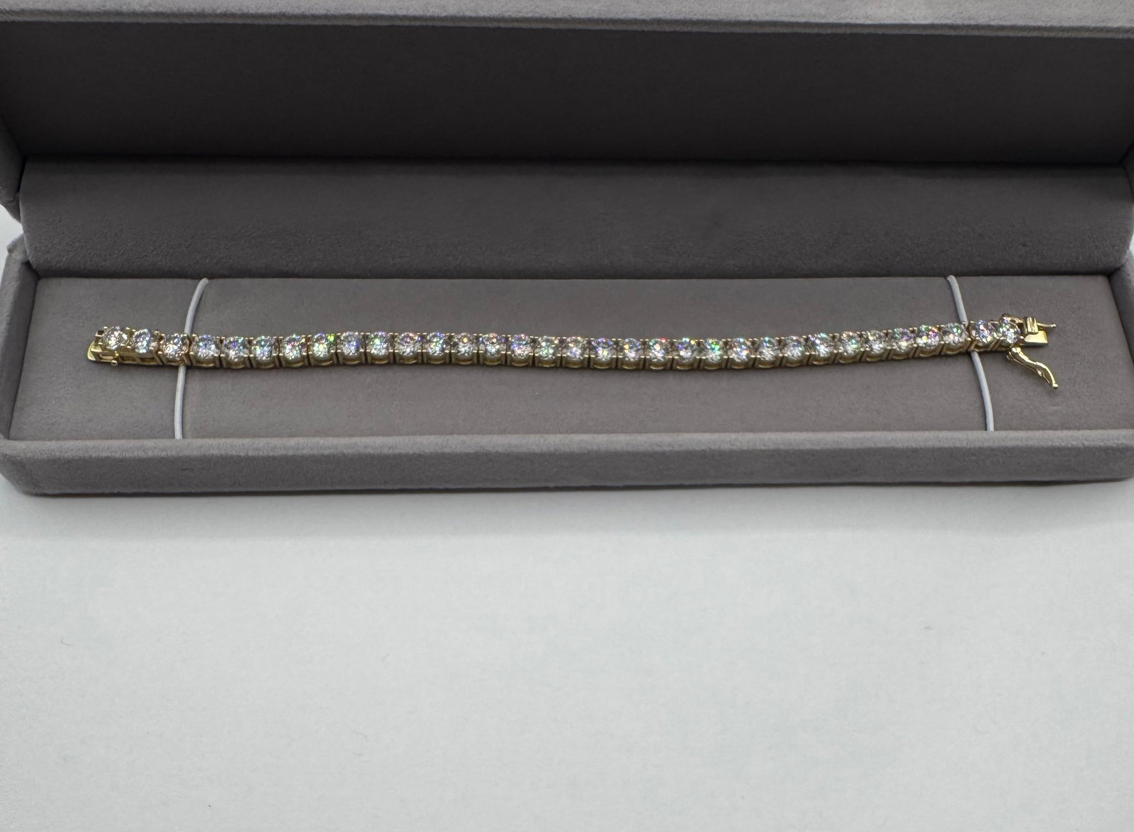 Moissanite Bracelet in Sterling with Yellow Gold Overlay, with Report & Box: 5 MM Moissanite Bracelet in Sterling with Yellow Gold Overlay, with Report & Box. Bracelet Length: 7 inches
