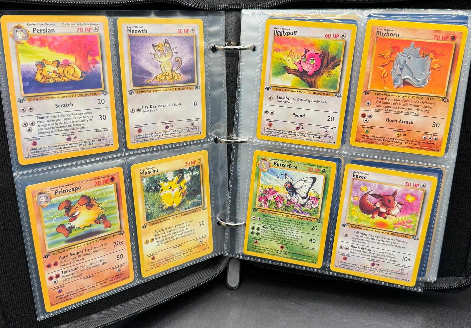 1999 Jungle Set 1st Edition Binder: 1999 Jungle Set 1st Edition Binder. Total of 32 1999 Pokemon first edition cards