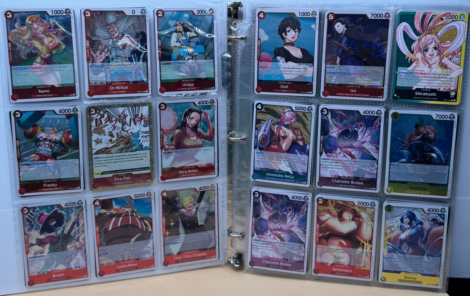 One Piece Foil Trading Cards Binder: One Piece Foil non foil Trading Cards Binder. Binder has over 200 One Piece Cards