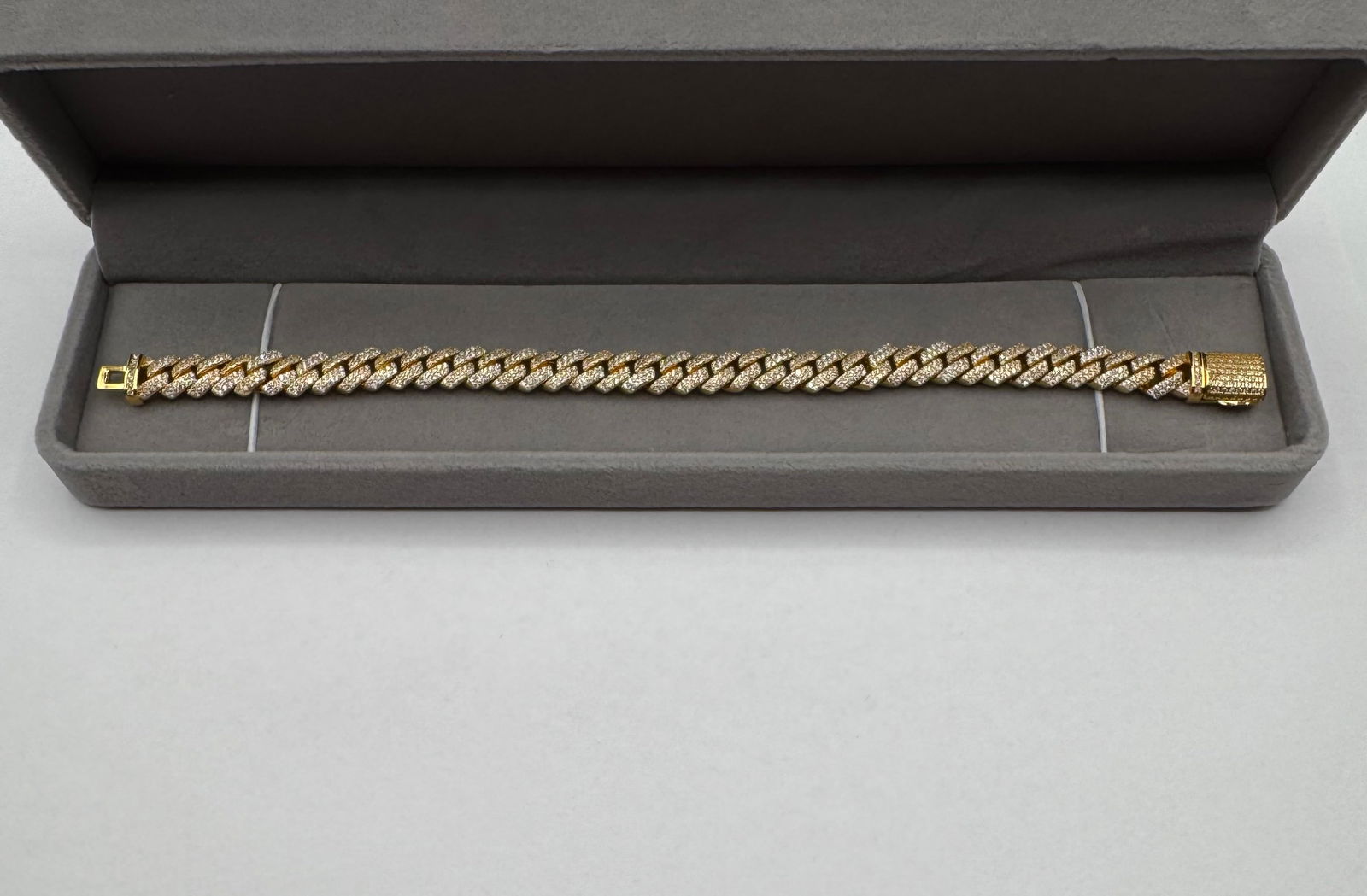 Cuban Yellow Gold VVS1 Moissanite Bracelet: VVS1 Real Moissanite Bracelet sterling silver 18k Plated Yellow Gold Necklace Size: 8MM Length : 8 inches Color Grade: D With certificate of authenticity