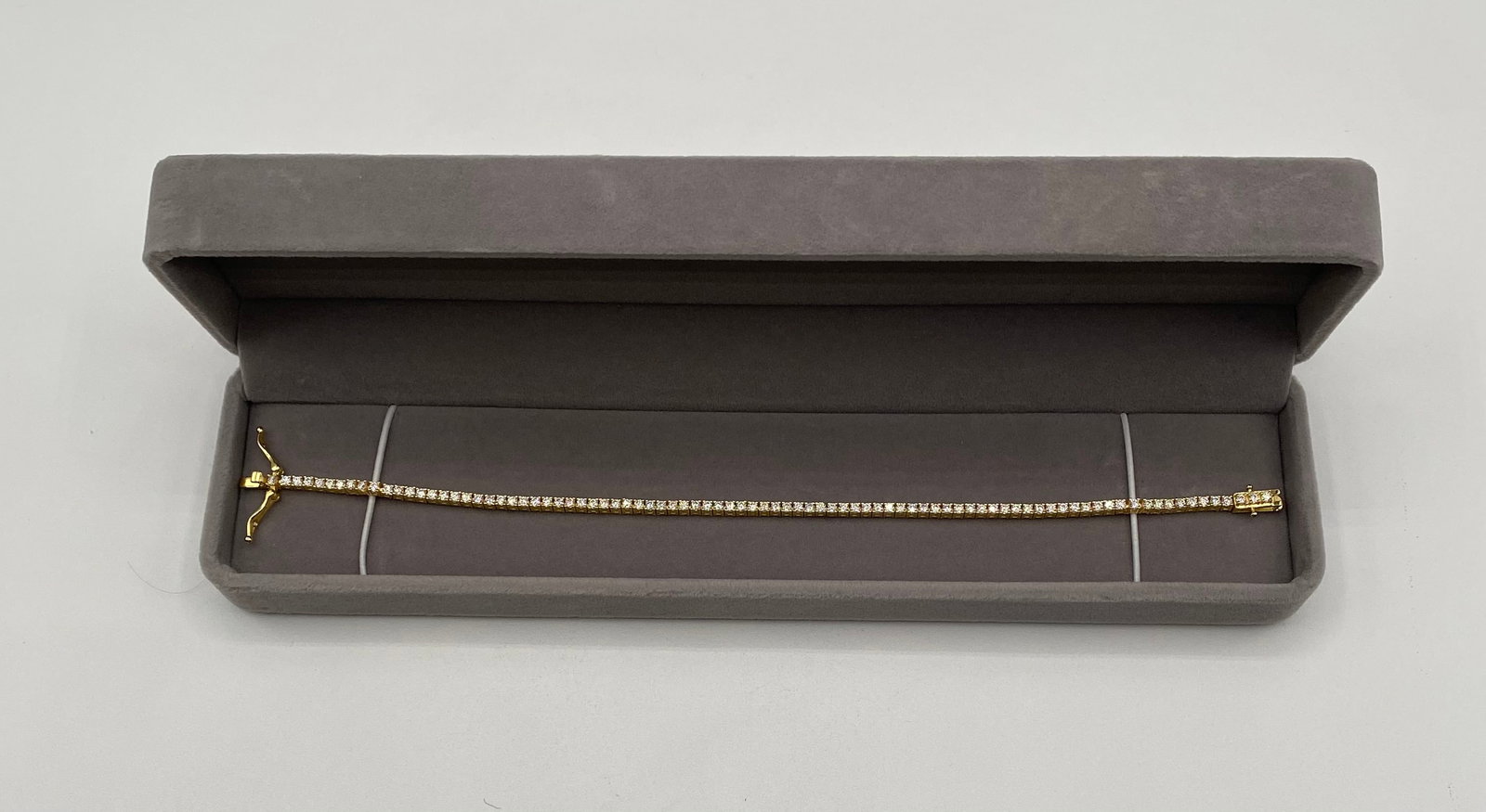 8" Moissanite Tennis Bracelet - 2mm Round Cut - 18K Gold over .925 Sterling Silver - GRA Certified: Up for auction is a stunning, classic tennis bracelet featuring brilliant-cut moissanite stones. Designed for high-end sparkle and durability, these stones are chemically and optically similar to diam