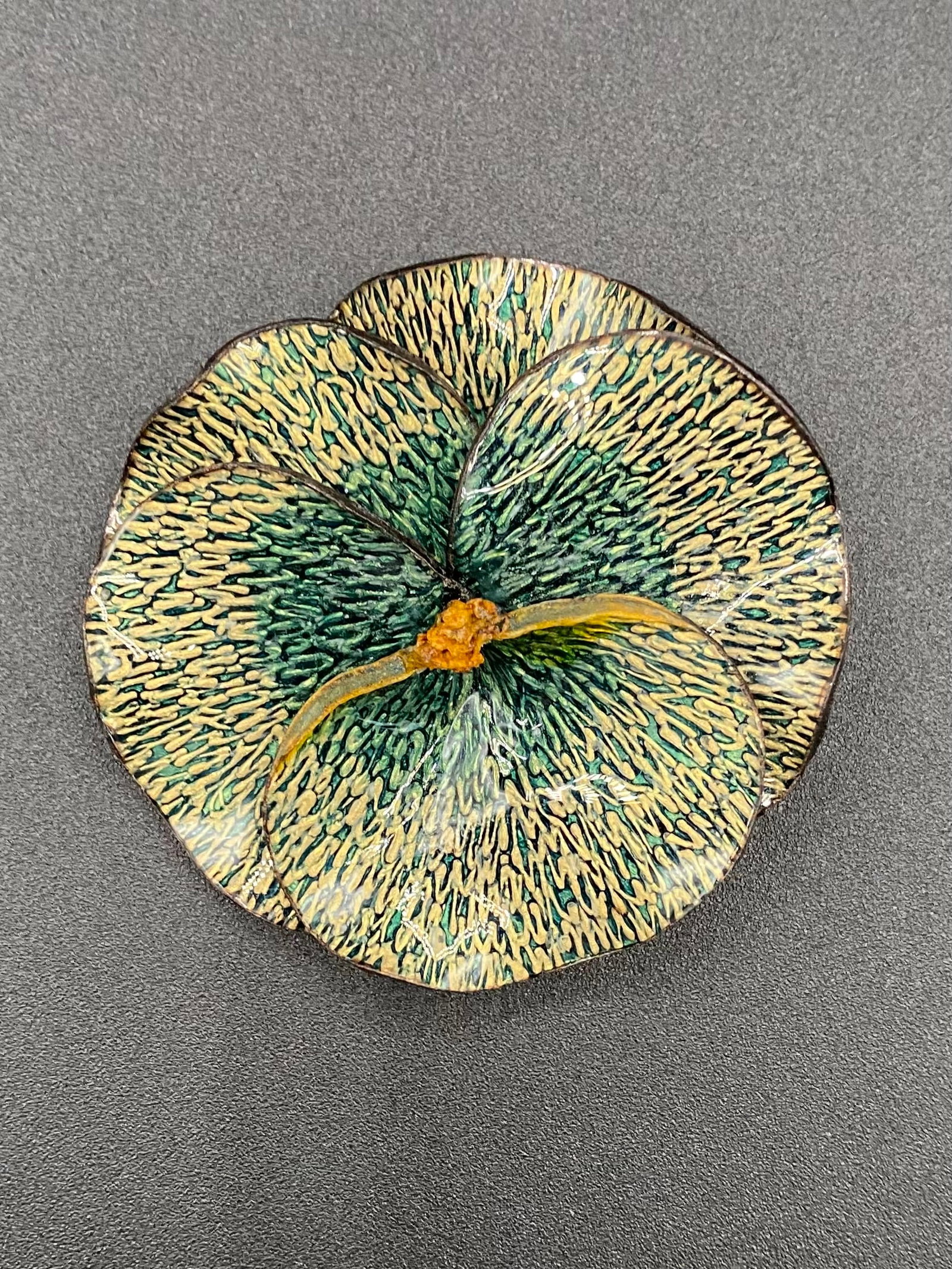 Large Vintage Hand-Painted Enamel Pansy Flower Brooch - Green & Gold: An exquisite botanical-inspired brooch depicting a blooming pansy. Features intricate textured detailing on the petals with a hand-painted enamel finish in shades of sage green, cream, and deep forest