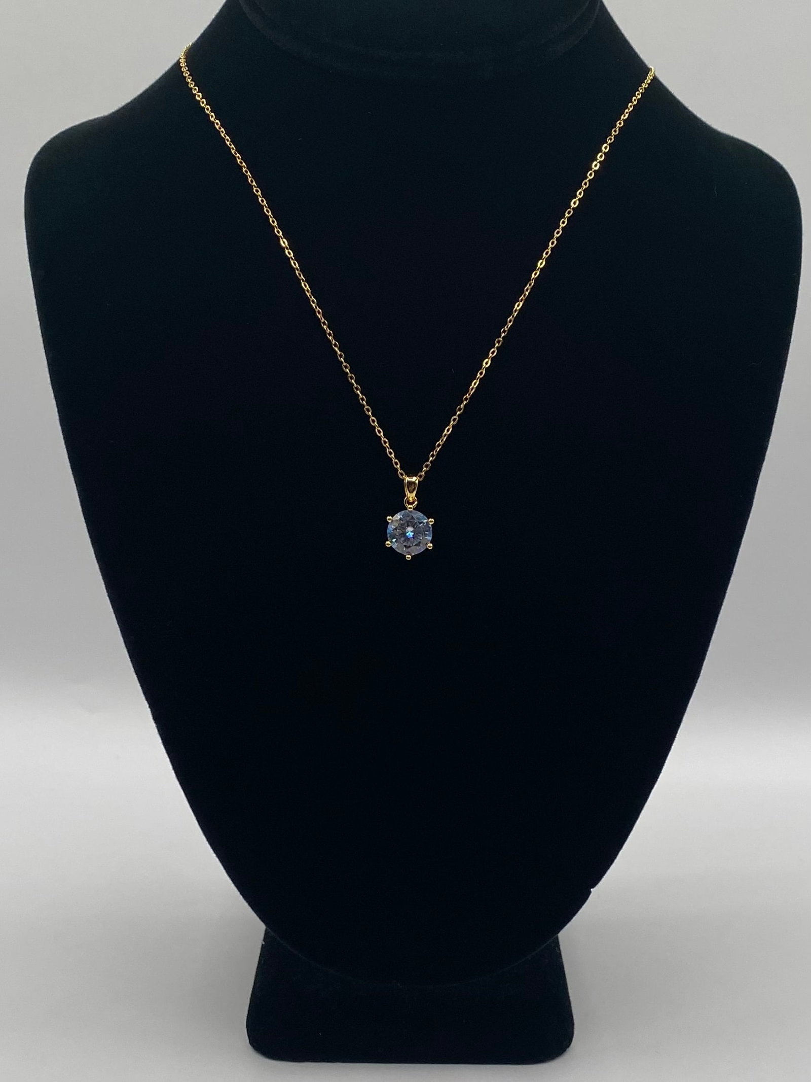 4.00 CTW Round Brilliant Cut Moissanite Pendant Necklace: Capture the brilliance of a high-carat diamond at a fraction of the cost. This stunning pendant features a massive 4-carat round brilliant cut moissanite, expertly set in a classic six-prong mounting