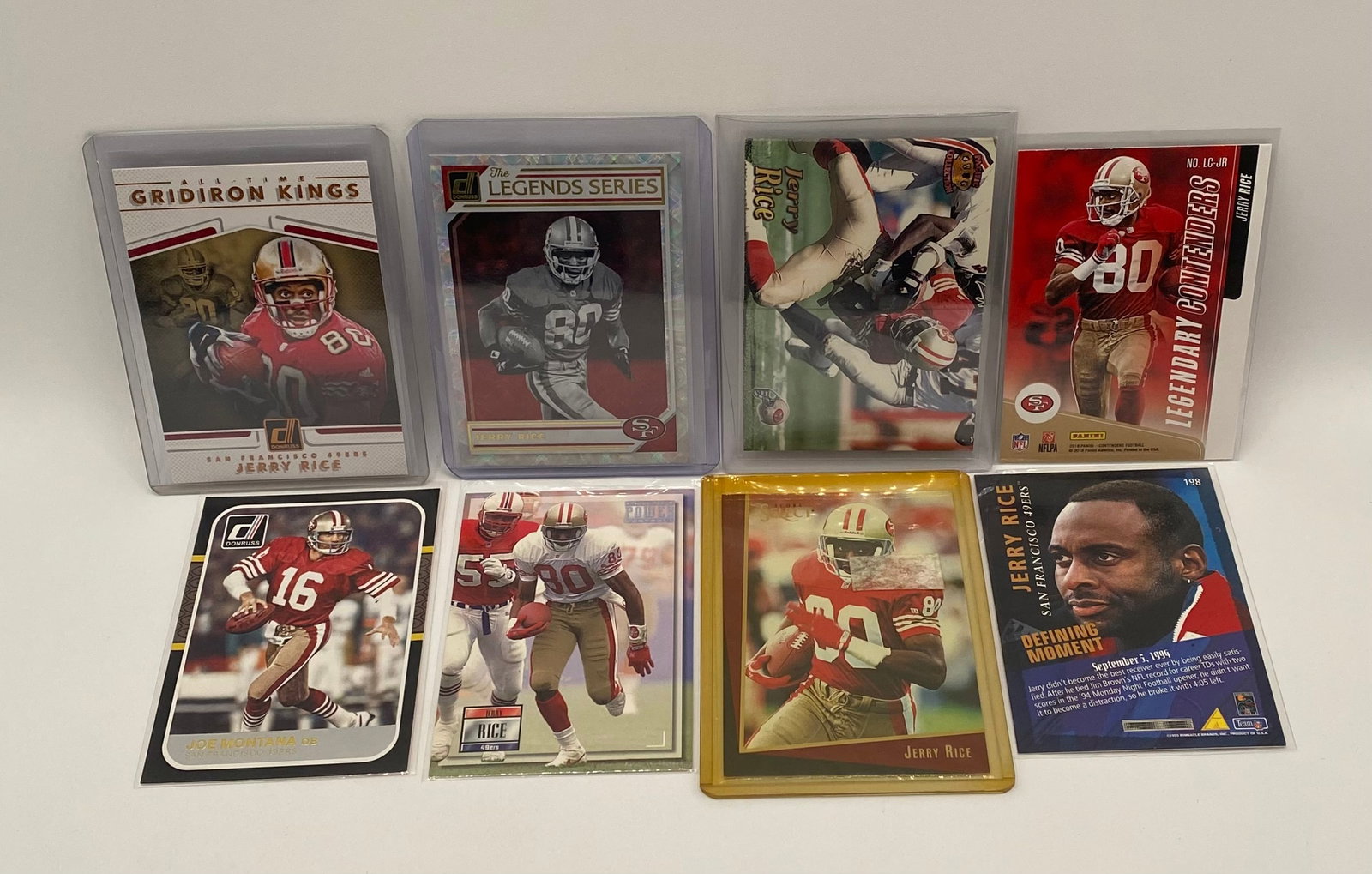 Jerry Rice & Joe Montana San Francisco 49ers Hall of Fame Lot (8 Cards): A premier collection of 8 cards featuring the legendary San Francisco 49ers duo, Jerry Rice and Joe Montana.• Highlights include: Donruss All-Time Gridiron Kings (Rice), Donruss Legends Series (R