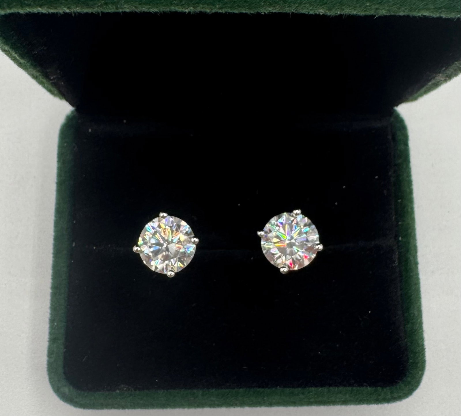 4.00 TCW Round Brilliant Clear Moissanite Stud Earrings 18K Yellow Gold GP Silver: Gemstone Type: Authentic Moissanite Total Carat Weight: 6.00 Carats total weight (3.00 carats per earring) Stone Cut/Shape: Brilliant Round Cut Stone Color: Classic Clear (VVS1 / Colorless D-F range