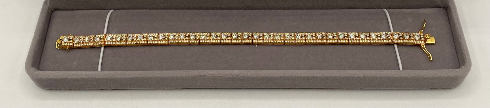 8" VVS Moissanite & 18K Gold Plated Sterling Silver Statement Bracelet: Luxurious VVS Moissanite Multi-Stone Statement Tennis BraceletAn exquisite, high-end variation of the traditional tennis bracelet. This piece features an intricate, wider geometric link setting
